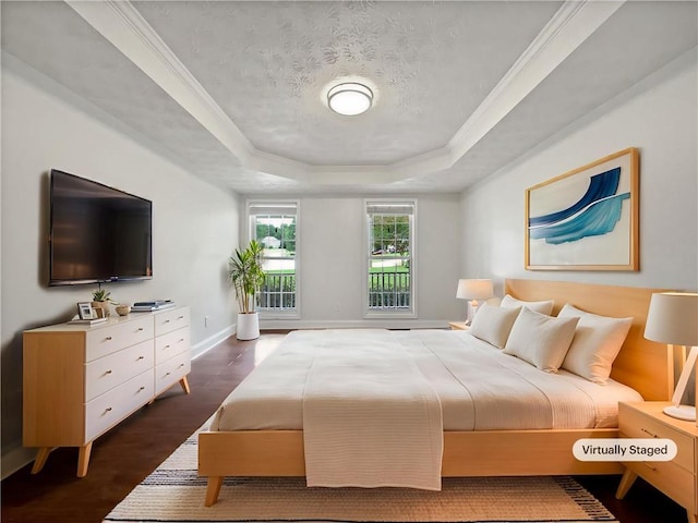 643 Windy Mill Way, Temple, GA 30179 - bedroom with a tray ceiling, dark wood finished floors, and a textured ceiling