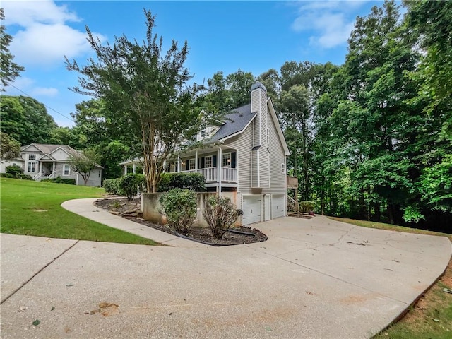 643 Windy Mill Way, Temple, GA 30179 - view of front of property with an attached garage, a front yard, a chimney, and driveway