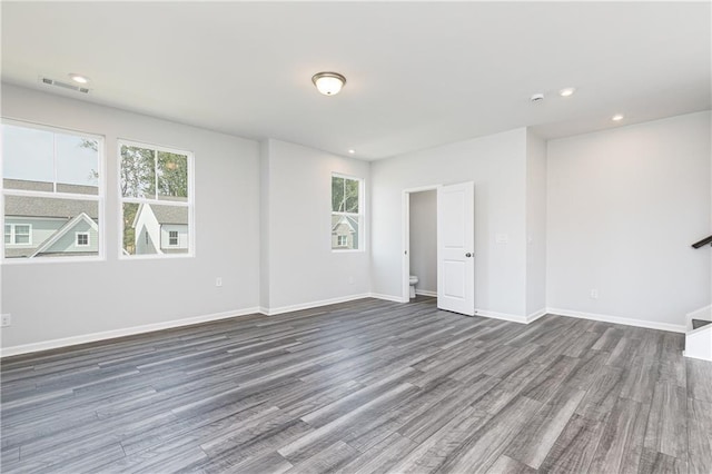 unfurnished room featuring dark hardwood / wood-style floors