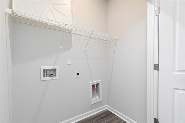 clothes washing area featuring washer hookup, dark hardwood / wood-style floors, and hookup for an electric dryer