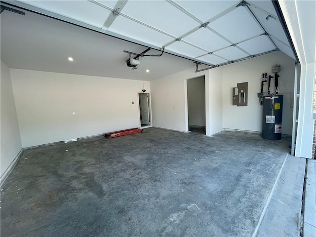 garage featuring electric panel, a garage door opener, and water heater