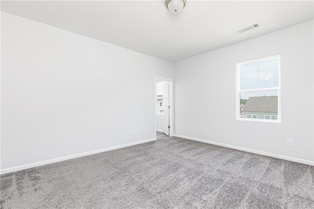 spare room with carpet flooring