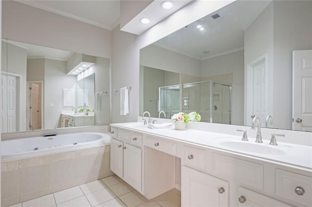 bathroom featuring a garden tub, crown molding, tile patterned floors, a shower stall, and a sink