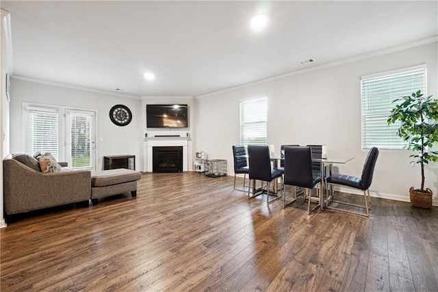 6004 Screech Owl Dr, Flowery Branch, GA 30542 - living room featuring dark wood finished floors, ornamental molding, a fireplace, baseboards, and recessed lighting