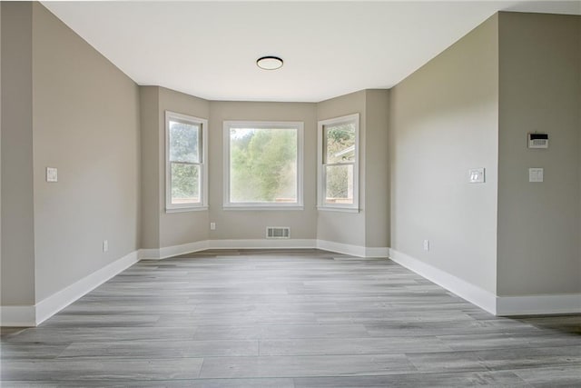 19 Quimby Jackson Rd, Newnan, GA 30263 - unfurnished dining area with wood finished floors and baseboards