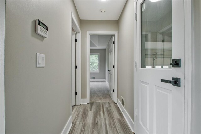 19 Quimby Jackson Rd, Newnan, GA 30263 - corridor featuring baseboards and wood finished floors
