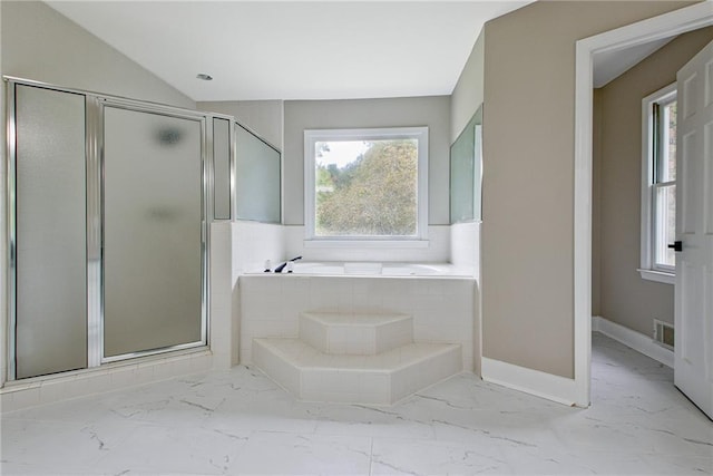 19 Quimby Jackson Rd, Newnan, GA 30263 - full bathroom with marble look tiles, a bath, a shower stall, and vaulted ceiling