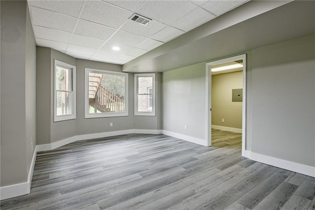 19 Quimby Jackson Rd, Newnan, GA 30263 - unfurnished room featuring a drop ceiling and wood finished floors