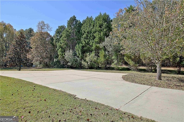 19 Quimby Jackson Rd, Newnan, GA 30263 - view of basketball court featuring a yard