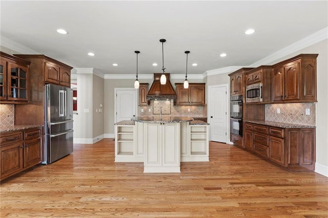 2602 Alcovy Club Dr, Dacula, GA 30019 - kitchen featuring appliances with stainless steel finishes, premium range hood, decorative backsplash, recessed lighting, and ornamental molding