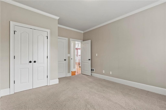 2602 Alcovy Club Dr, Dacula, GA 30019 - unfurnished bedroom with carpet floors, crown molding, and a closet