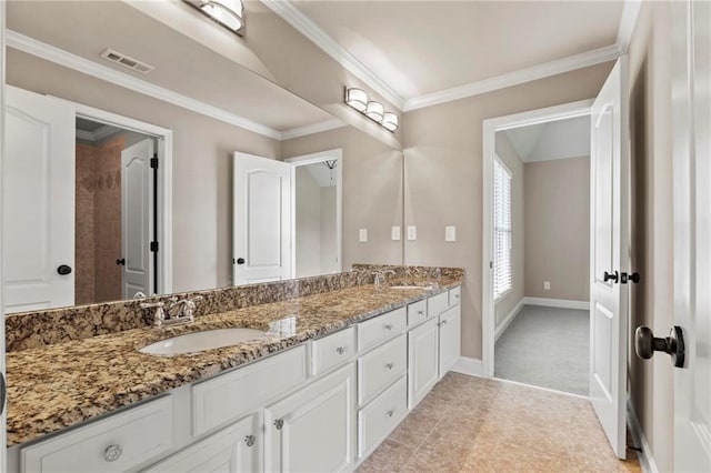 2602 Alcovy Club Dr, Dacula, GA 30019 - bathroom featuring double vanity and ornamental molding
