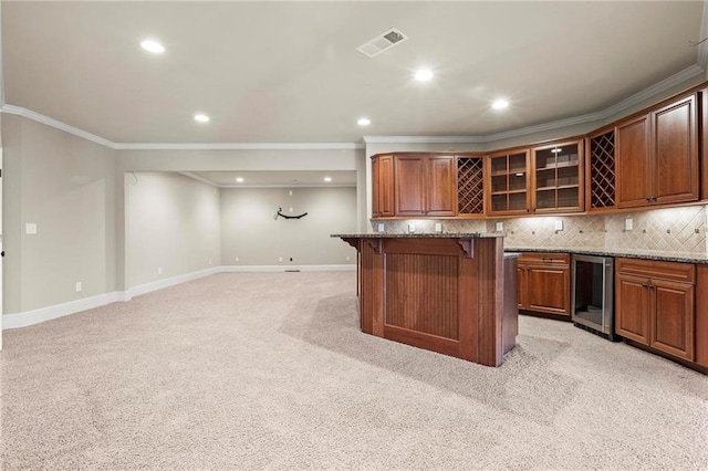 2602 Alcovy Club Dr, Dacula, GA 30019 - indoor wet bar featuring wine cooler, ornamental molding, recessed lighting, light colored carpet, and tasteful backsplash