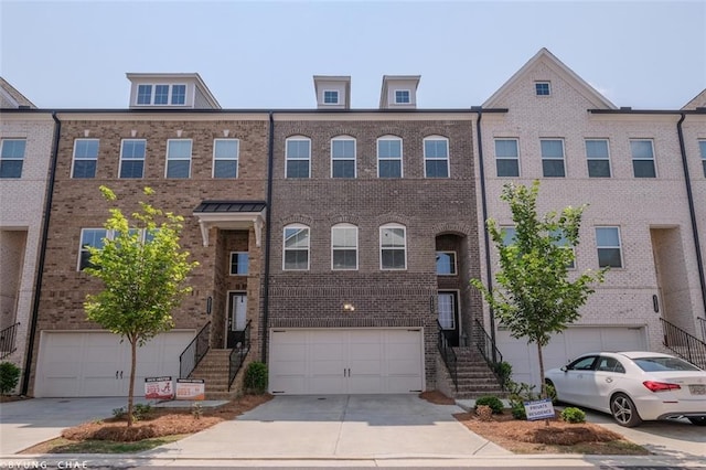 2247 Pink Hawthorn Dr, Buford, GA 30518 - multi unit property with driveway, a garage, and brick siding