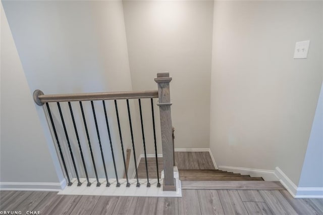2247 Pink Hawthorn Dr, Buford, GA 30518 - staircase with wood finished floors and baseboards