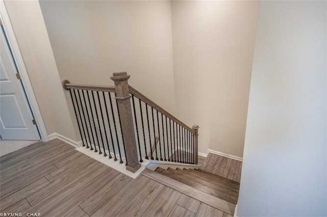 2247 Pink Hawthorn Dr, Buford, GA 30518 - stairs with wood finished floors and baseboards