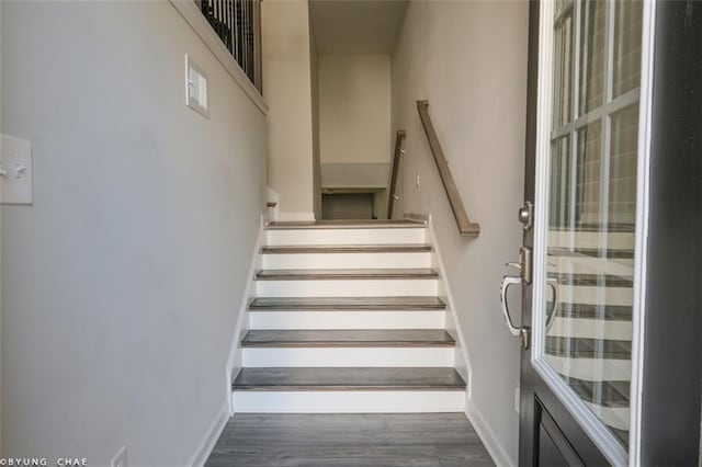 2247 Pink Hawthorn Dr, Buford, GA 30518 - stairway featuring wood finished floors and baseboards