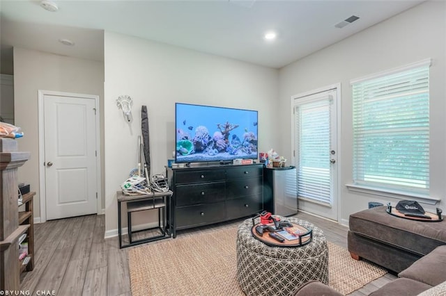 2247 Pink Hawthorn Dr, Buford, GA 30518 - living room featuring light wood-type flooring and recessed lighting