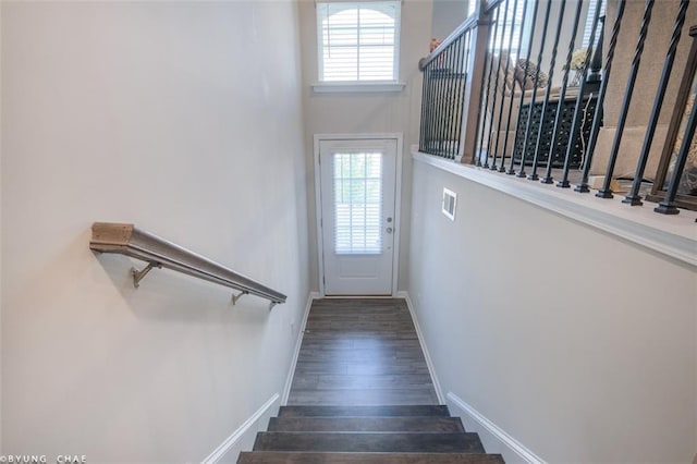2247 Pink Hawthorn Dr, Buford, GA 30518 - stairs with healthy amount of natural light and wood finished floors