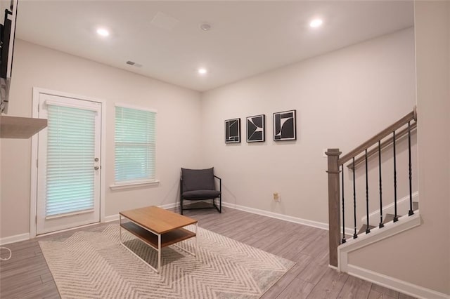 2247 Pink Hawthorn Dr, Buford, GA 30518 - sitting room with wood finished floors, recessed lighting, and stairs