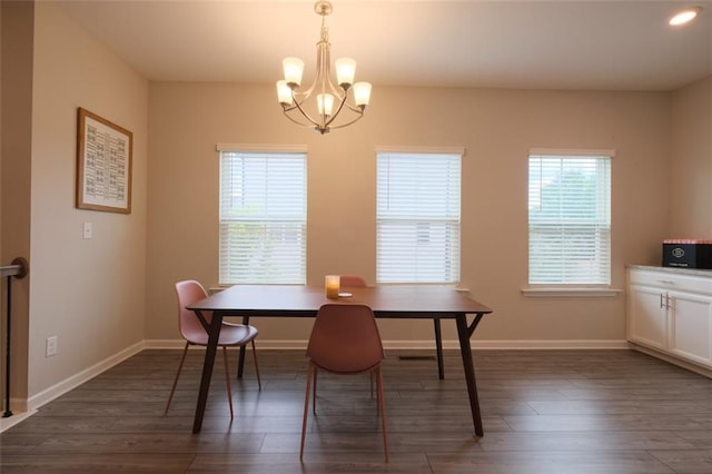 2247 Pink Hawthorn Dr, Buford, GA 30518 - dining space featuring a chandelier and dark wood finished floors