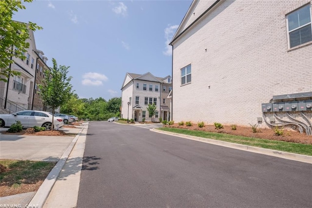 2247 Pink Hawthorn Dr, Buford, GA 30518 - view of asphalt road featuring curbs