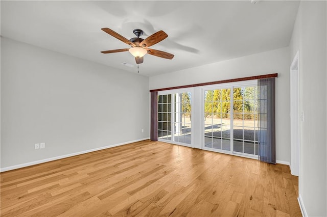 unfurnished room with ceiling fan and light hardwood / wood-style floors