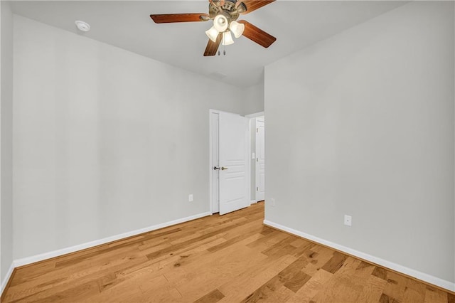 unfurnished room featuring ceiling fan and light wood-type flooring