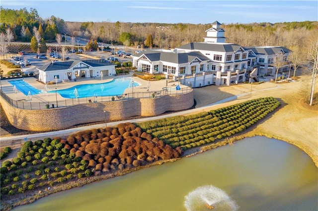 view of pool with a water view