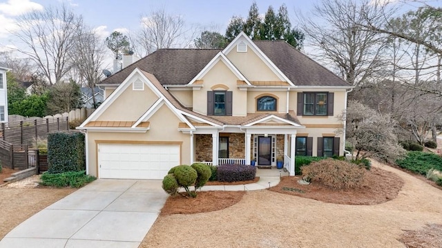 view of front of property with a garage and a porch