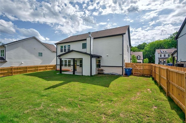 rear view of house with a patio area