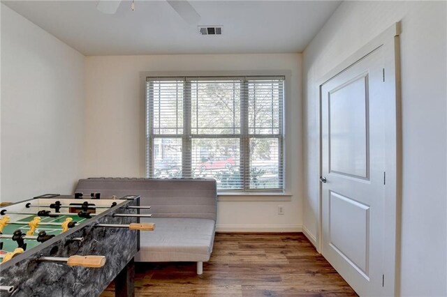 bedroom featuring ceiling fan and wood-type flooring