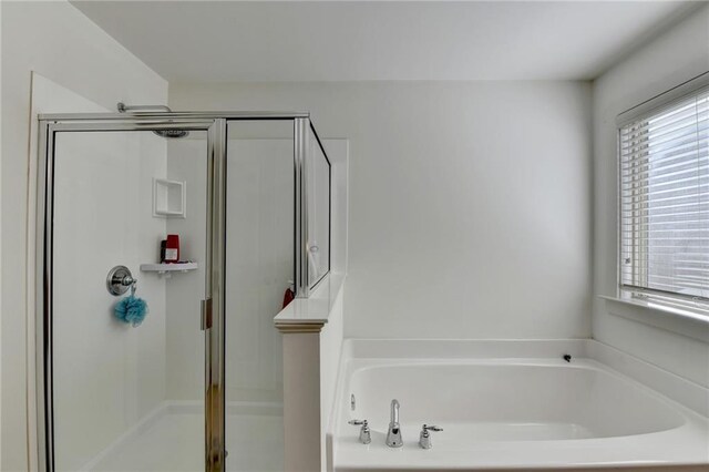 bathroom with independent shower and bath