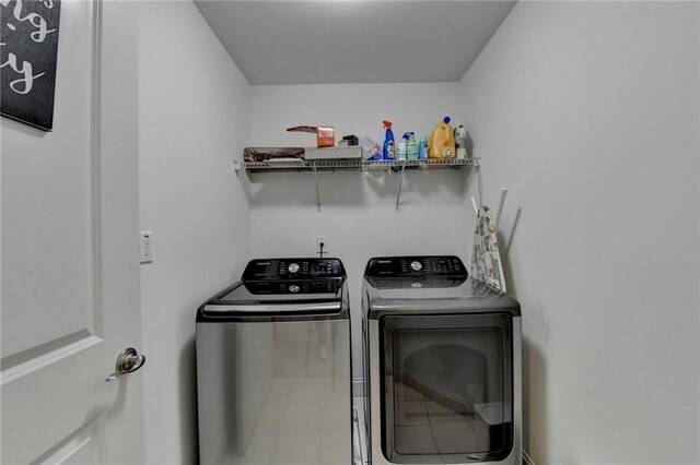 laundry area featuring washing machine and dryer