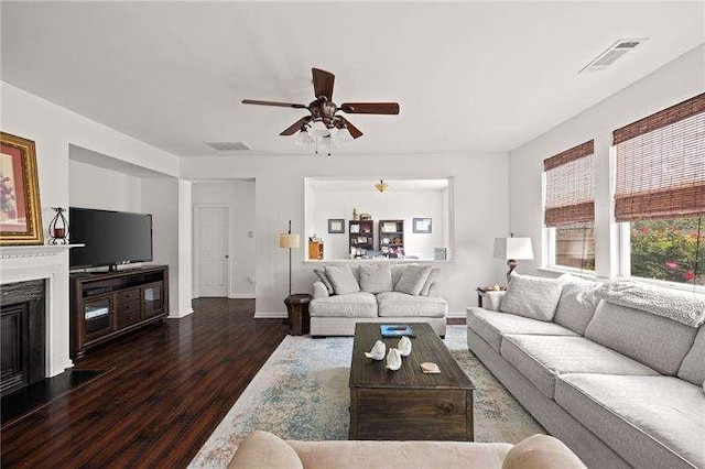 316 Branch Valley Dr NE, Dallas, GA 30132 - living area featuring wood finished floors, ceiling fan, baseboards, and a fireplace with flush hearth