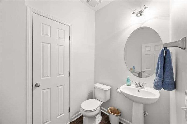 316 Branch Valley Dr NE, Dallas, GA 30132 - bathroom featuring toilet and wood finished floors