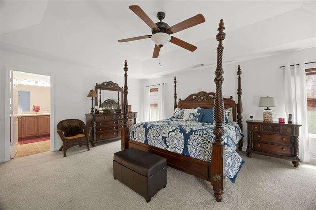 316 Branch Valley Dr NE, Dallas, GA 30132 - bedroom with light carpet, connected bathroom, and a ceiling fan
