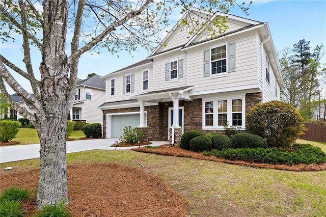 316 Branch Valley Dr NE, Dallas, GA 30132 - view of front of property featuring a garage, stone siding, and concrete driveway