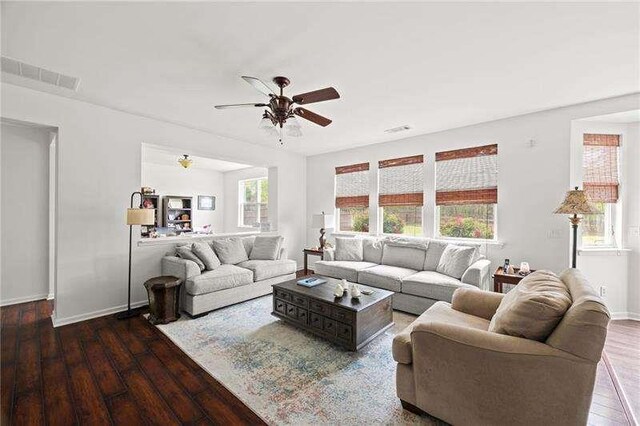 316 Branch Valley Dr NE, Dallas, GA 30132 - living room with dark wood-type flooring, a ceiling fan, and baseboards