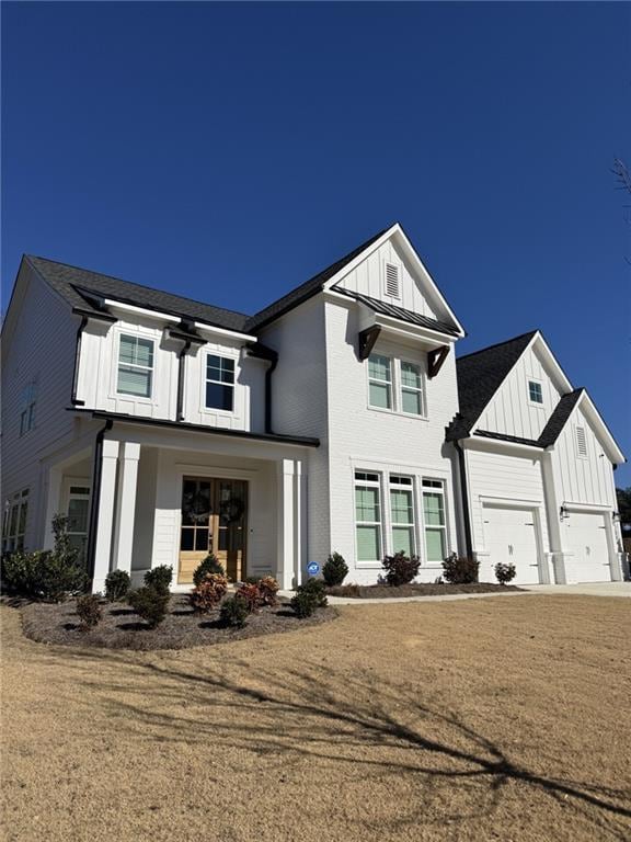 view of front of property with a garage