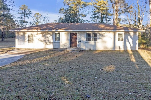 ranch-style house featuring a front yard