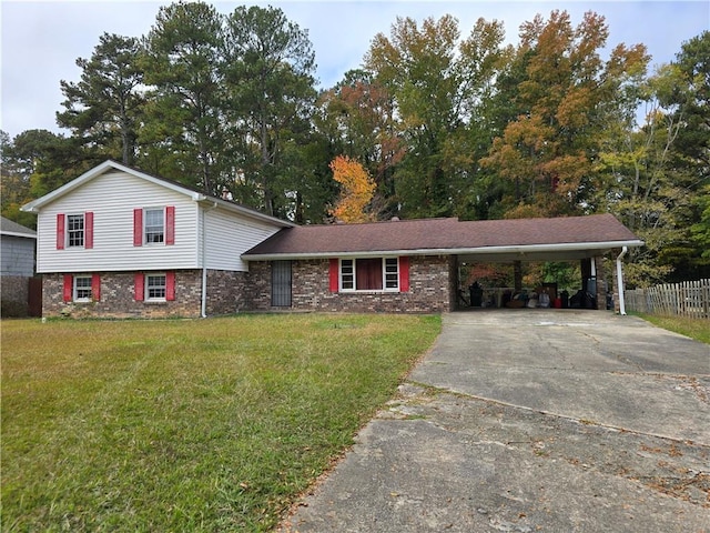 tri-level home featuring a front yard and a carport