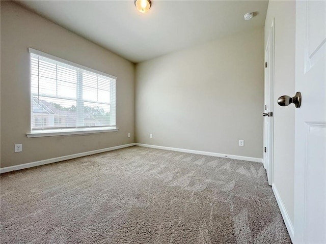 5119 Aylesbury Ct, Hoschton, GA 30548 - carpeted empty room with baseboards