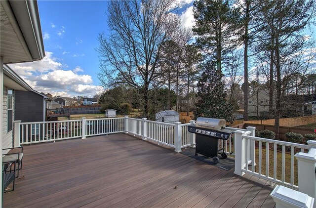 wooden terrace with grilling area