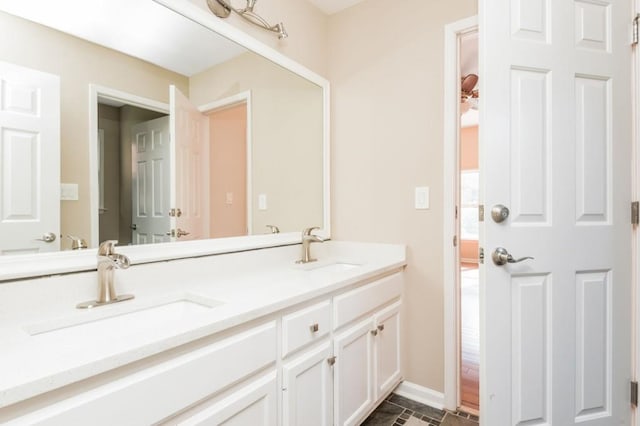 bathroom featuring hardwood / wood-style floors and vanity