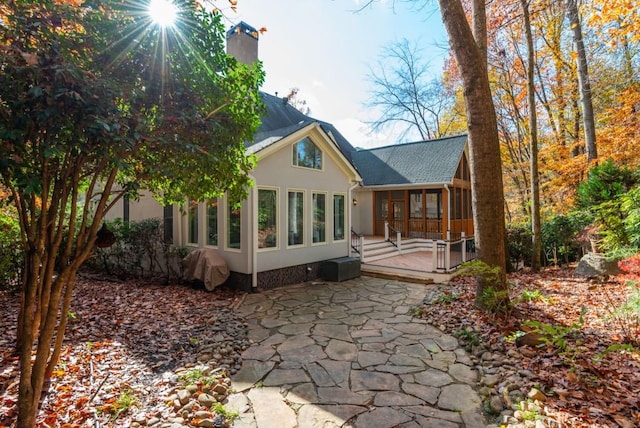 rear view of house with a patio area and a deck