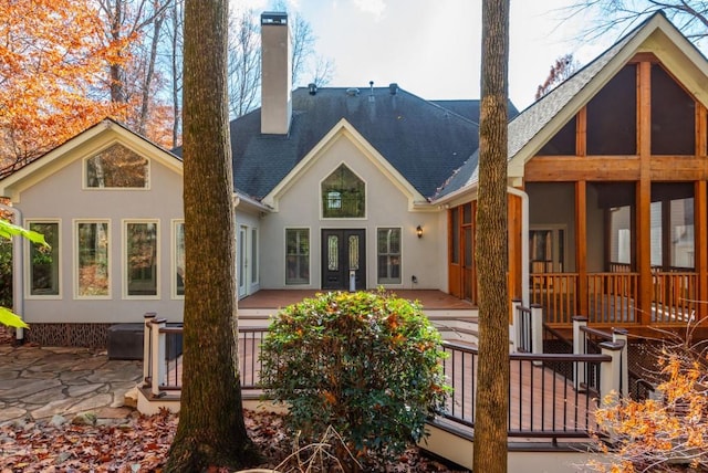 back of house with a patio