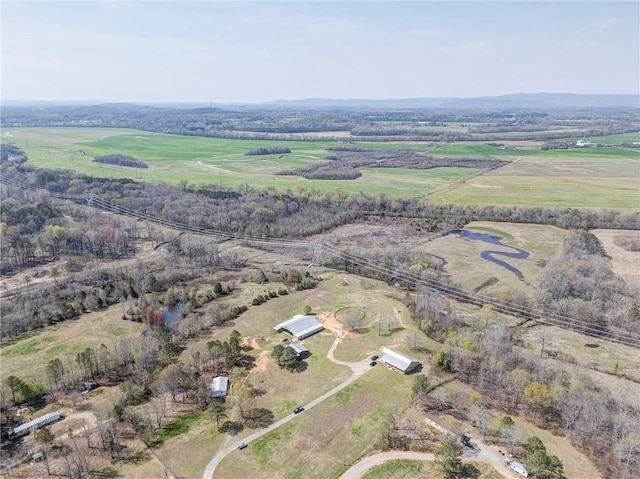 birds eye view of property featuring a rural view