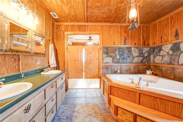 bathroom with tile flooring, ceiling fan, oversized vanity, double sink, and wood ceiling