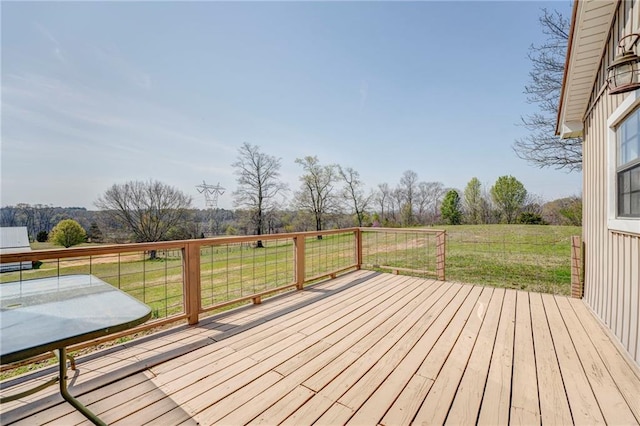 deck featuring a lawn